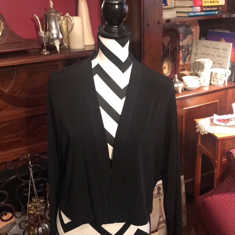 Black shrug
